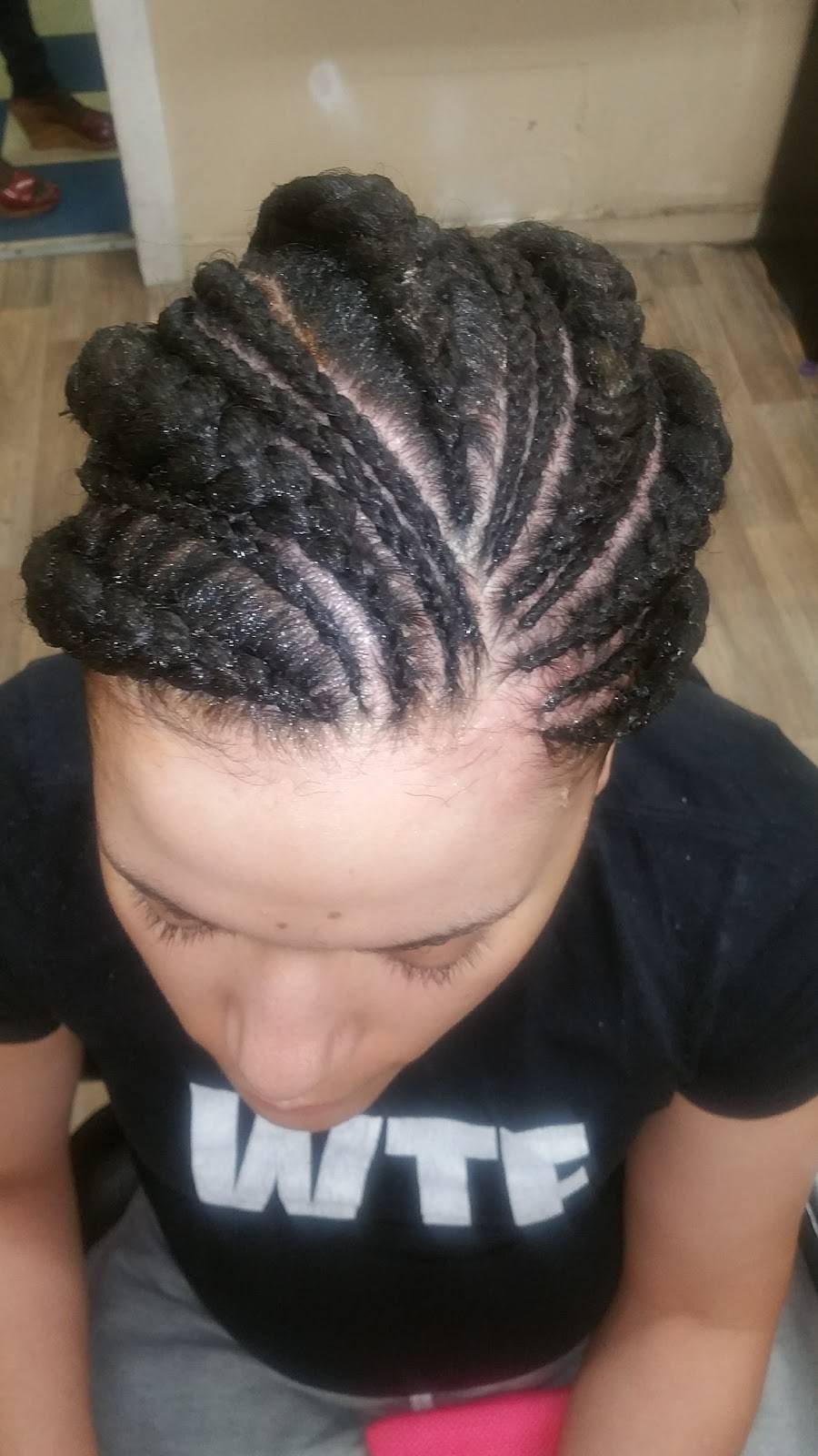 Nimann African Braiding | 5439 Troost Ave, Kansas City, MO 64110, USA | Phone: (816) 363-3411