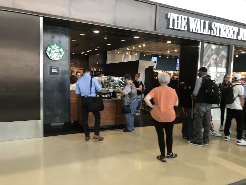 The Wall Street Journal with Starbucks Coffee | Near Gate B8, McNamara Terminal, Worldgateway Pl, Detroit, MI 48242, USA | Phone: (734) 941-4087